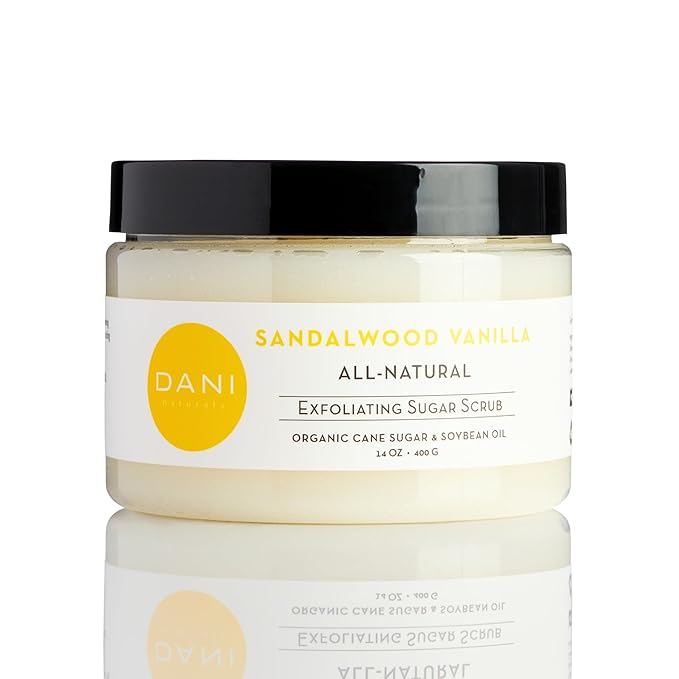Naturals Exfoliating Sugar Scrub - Warm Sandalwood Vanilla, featuring organic cane sugar and shea butter, gently exfoliates and deeply nourishes for smooth, radiant, and hydrated skin – 14 oz