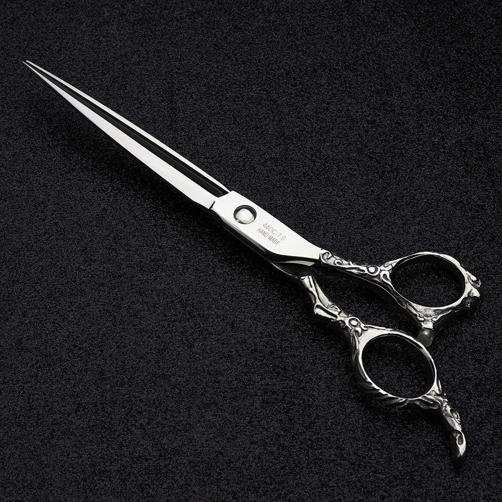 Hairdressing salon hairdressers use 7-inch hair clippers, hairstyling tools, and scissors